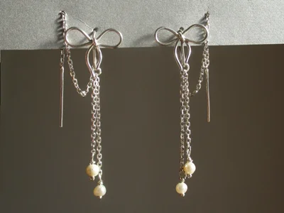 گوشواره پاپیونی بخیه ای